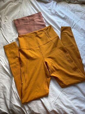 Girlfriend collective high rise compressive leggings 28” size small orange